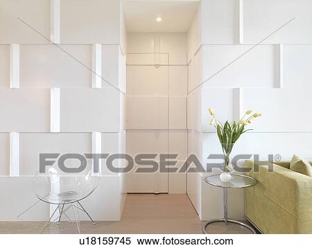 Stock Photography - Modern interior with door camouflaged with wall. Fotosearch
