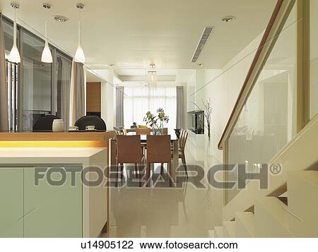Stock Image - Modern kitchen and dining room. Fotosearch