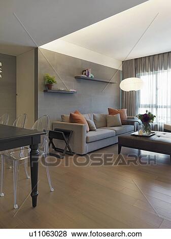 Modern living room and dining room with hardwood floors View Large Photo Image Stock Photo - Modern living room and dining room with hardwood floors. Fotosearch
