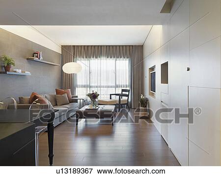 Modern living room and dining room with hardwood floors View Large Photo Image Stock Photo - Modern living room and dining room with hardwood floors. Fotosearch