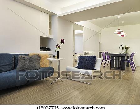 Modern living room and dining room with hardwood floors View Large Photo Image Stock Photography - Modern living room and dining room with hardwood floors. Fotosearch