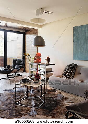 Modern living room with animal skin rug View Large Photo Image Stock Photo - Modern living room with animal skin rug. Fotosearch
