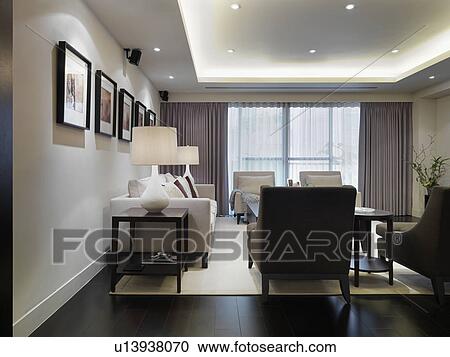 Modern living room with recessed lights View Large Photo Image Stock Image - Modern living room with recessed lights. Fotosearch
