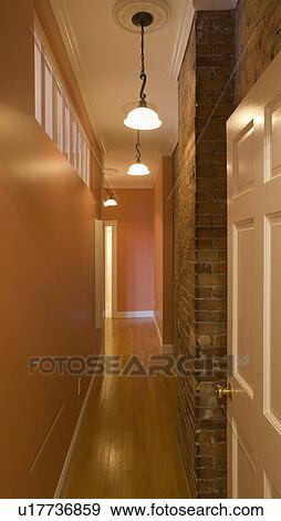 Stock Photo - Narrow hallway with hardwood floor. Fotosearch