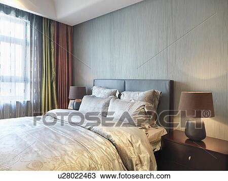 Nightstand and lamps on both sides of bed View Large Photo Image Stock Image - Nightstand and lamps on both sides of bed. Fotosearch