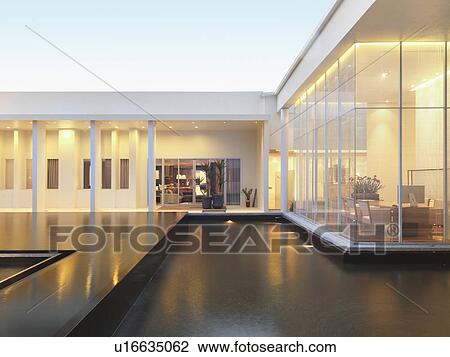 Reflection pool outside modern home View Large Photo Image Stock Image - Reflection pool outside modern home. Fotosearch