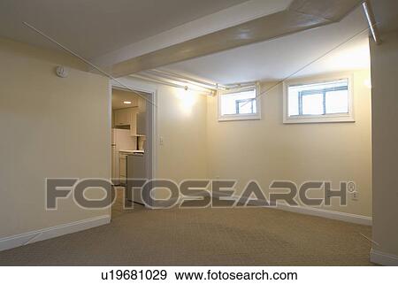 Room in empty apartment with carpeting View Large Photo Image Stock Photo - Room in empty apartment with carpeting. Fotosearch