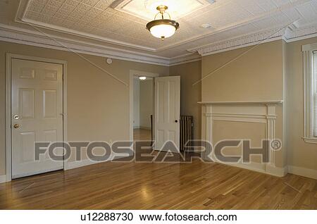 Room in empty apartment with hardwood floor View Large Photo Image Stock Image - Room in empty apartment with hardwood floor. Fotosearch