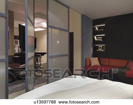 Rotating partition between bedroom and living room View Large Photo Image Stock Photo - Rotating partition between bedroom and living room. Fotosearch
