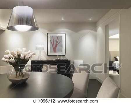 Round dining table with tulip centerpiece View Large Photo Image Stock Image - Round dining table with tulip centerpiece. Fotosearch