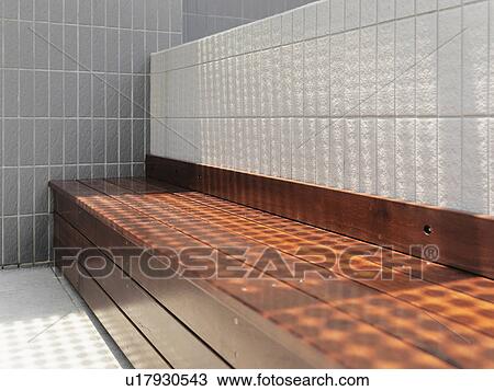Stock Image - Shadows on wooden bench. Fotosearch