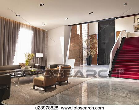 Sitting area and red staircase in modern interior View Large Photo Image Stock Photography - Sitting area and red staircase in modern interior. Fotosearch