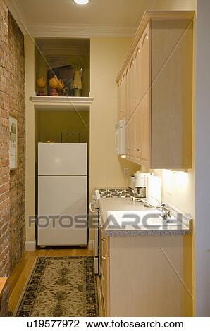 Small apartment kitchen View Large Photo Image Stock Image - Small apartment kitchen. Fotosearch