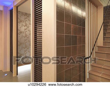Stock Photograph - Staircase and tile walls in modern home. Fotosearch