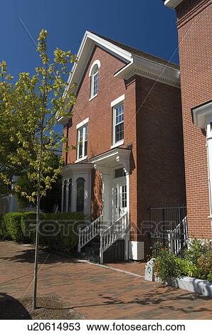 Stock Image - Traditional brick home. Fotosearch