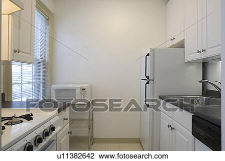 Traditional empty kitchen View Large Photo Image Stock Image - Traditional empty kitchen. Fotosearch
