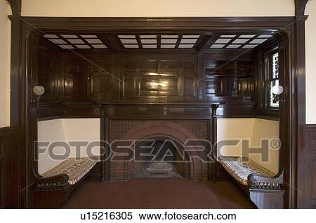 Stock Photography - Tudor style sitting area near fire place. Fotosearch