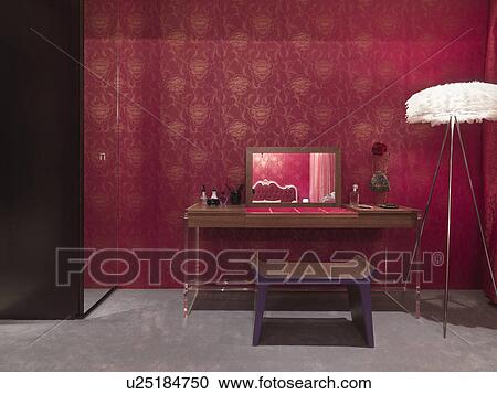 Stock Image - Vanity in room with red walls. Fotosearch