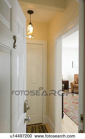 Stock Image - View through front door to apartment. Fotosearch
