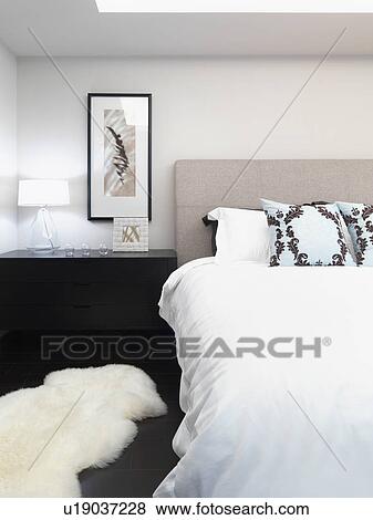 White bedroom with animal skin rug View Large Photo Image Stock Photo - White bedroom with animal skin rug. Fotosearch