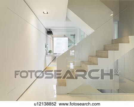 Stock Image - White staircase in modern home. Fotosearch