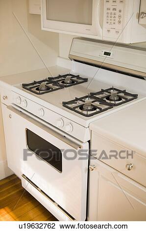 Stock Image - White stove and countertop. Fotosearch