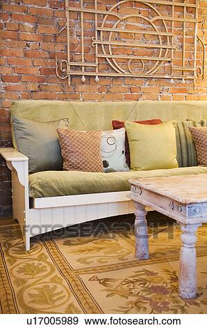 Wooden coffee table and futon View Large Photo Image Stock Photo - Wooden coffee table and futon. Fotosearch