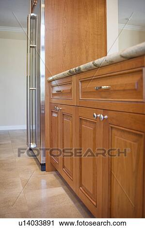 Wooden kitchen cabinets and drawers View Large Photo Image Stock Image - Wooden kitchen cabinets and drawers. Fotosearch