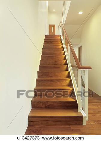 Stock Image - Wooden modern staircase. Fotosearch