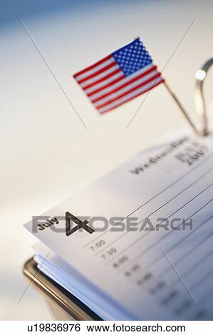Stock Photograph - American Flag in day timer. Fotosearch