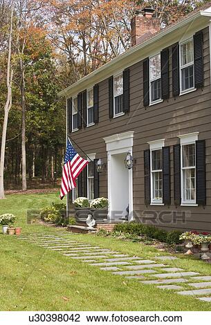 American flag on house View Large Photo Image Stock Image - American flag on house. Fotosearch
