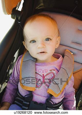 Stock Image - Baby in stroller. Fotosearch