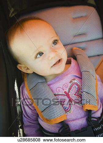 Stock Photo - Baby in stroller. Fotosearch