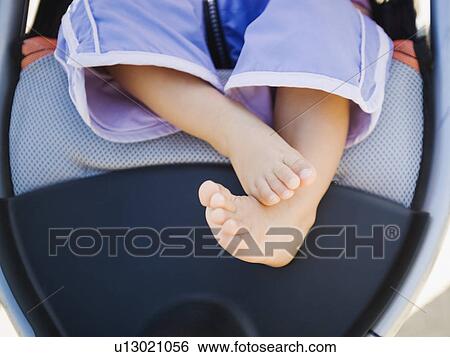 Stock Photograph - Baby's feet. Fotosearch
