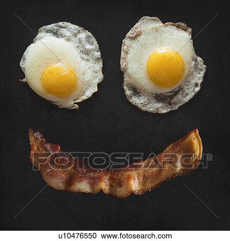 Stock Image - Bacon and eggs. Fotosearch