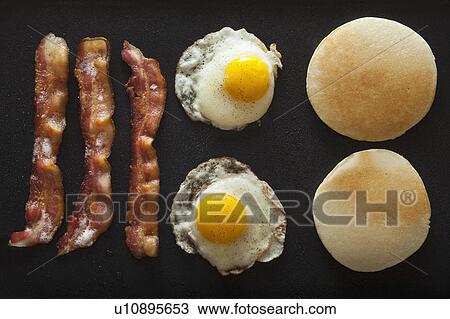 Stock Image - Bacon and eggs. Fotosearch