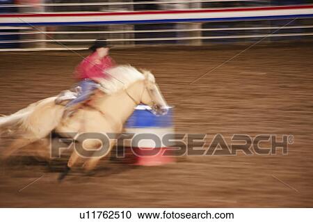 Barrel racing View Large Photo Image Stock Image - Barrel racing. Fotosearch