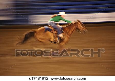 Stock Image - Barrel racing. Fotosearch