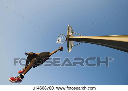 Stock Image - Basketball player. Fotosearch