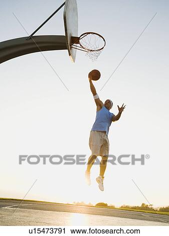 Stock Image - Basketball player. Fotosearch