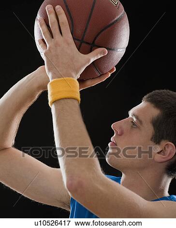 Stock Photo - Basketball player. Fotosearch
