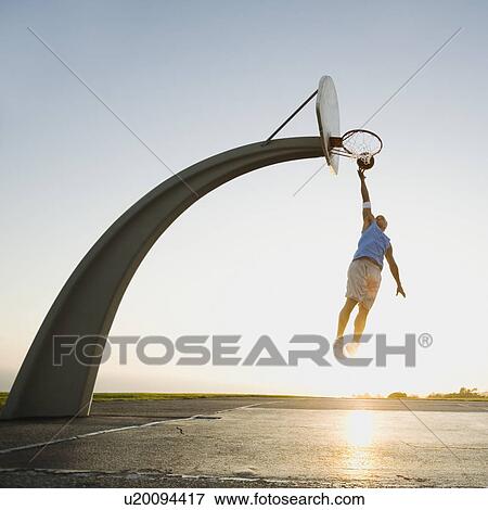 Stock Photo - Basketball player. Fotosearch