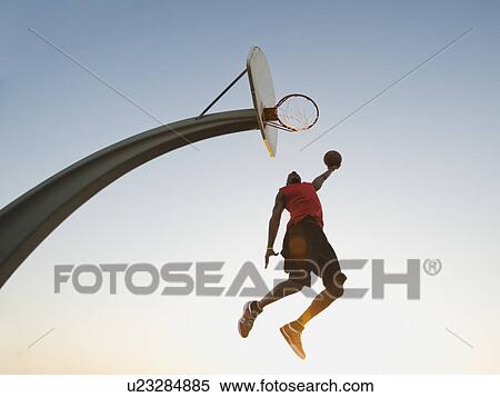 Stock Photography - Basketball player. Fotosearch