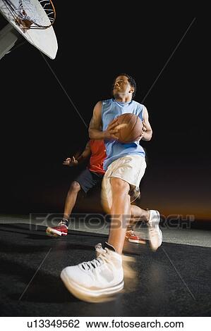 Stock Image - Basketball players. Fotosearch