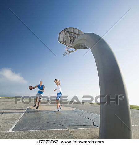 Stock Image - Basketball players. Fotosearch