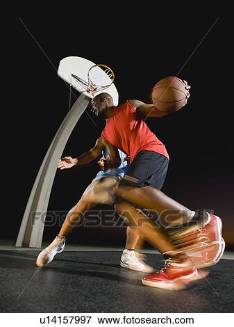 Stock Photo - Basketball players. Fotosearch