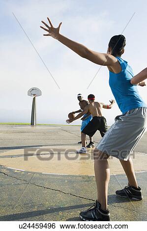 Stock Photograph - Basketball players. Fotosearch