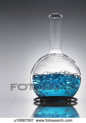 Stock Photo - Beaker of blue mixture. Fotosearch