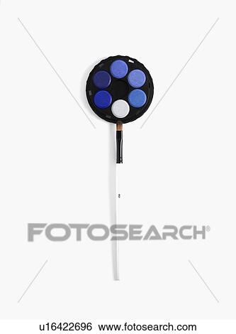 Stock Photograph - Blue paint and brush. Fotosearch