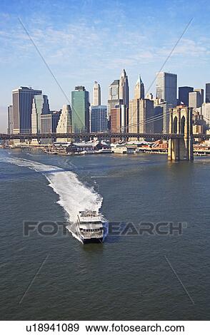 Stock Photo - Boat and cityscape. Fotosearch